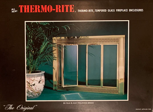 1972 polished brass bi-fold fireplace door